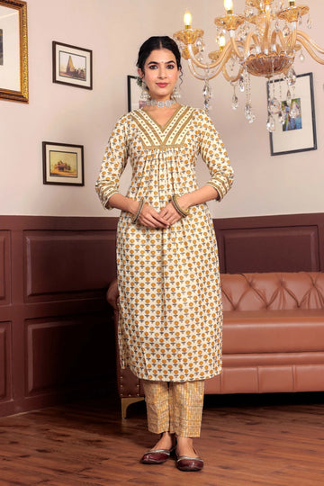 Mustard Printed cotton kurta highlighted with gotta lace with trouser