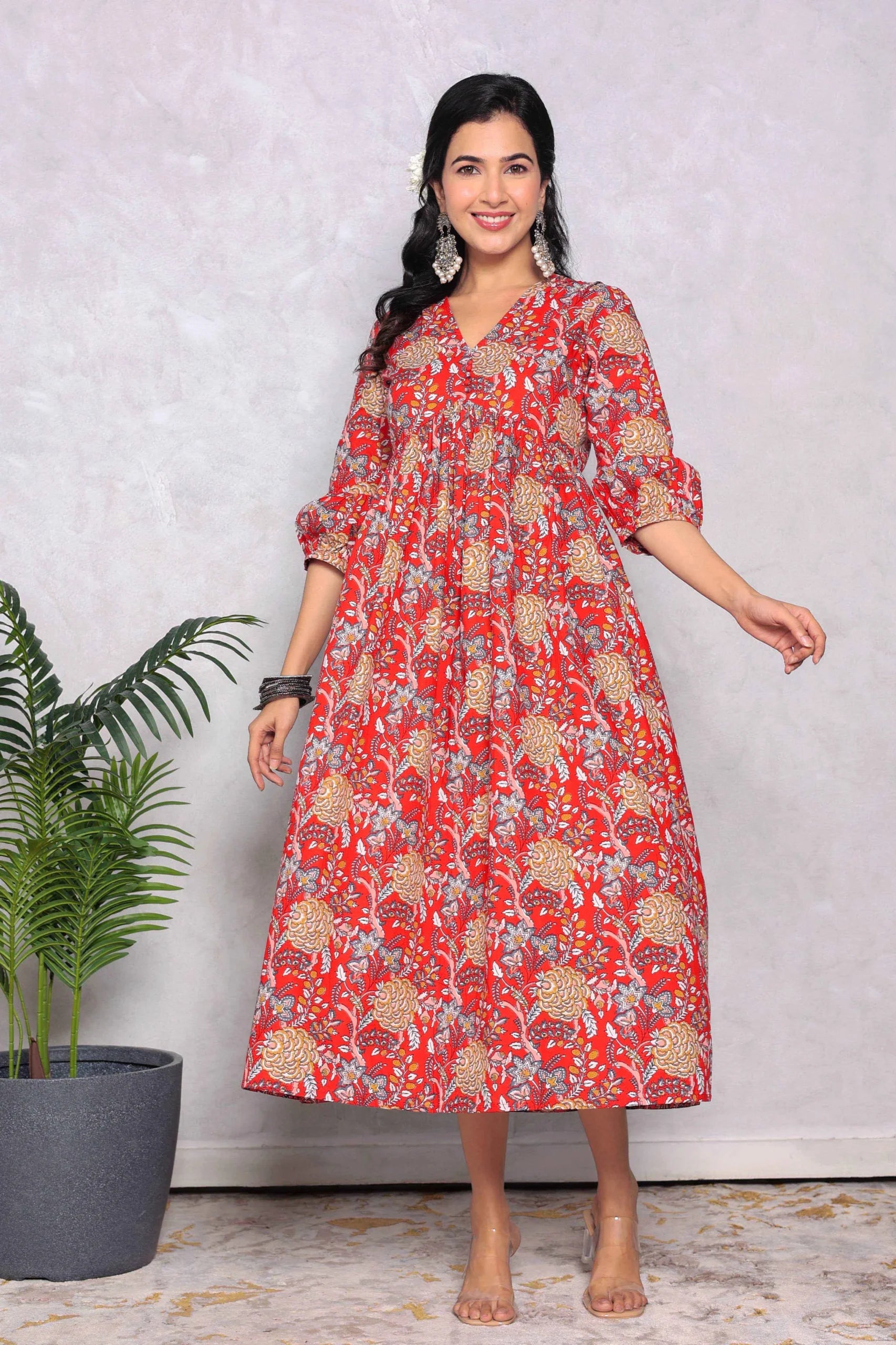 Red Block Printed V-Neck Dress With Flared Hem & Pleated Sleeves