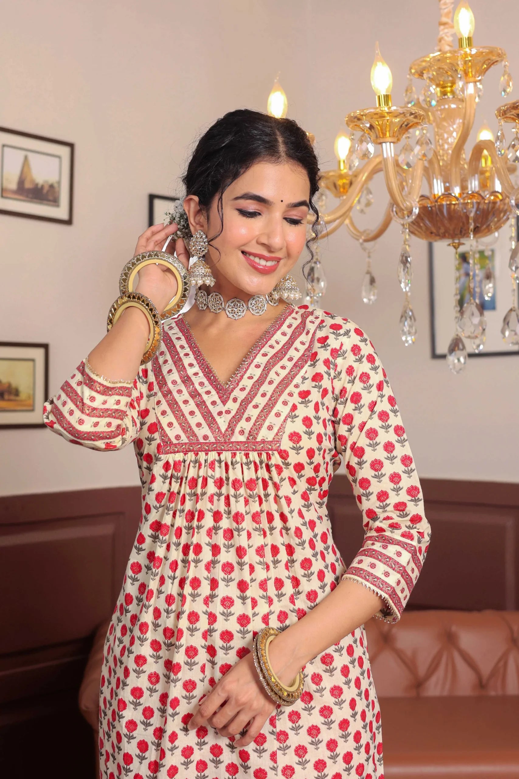 Pink Printed cotton kurta highlighted with gotta lace with trouser