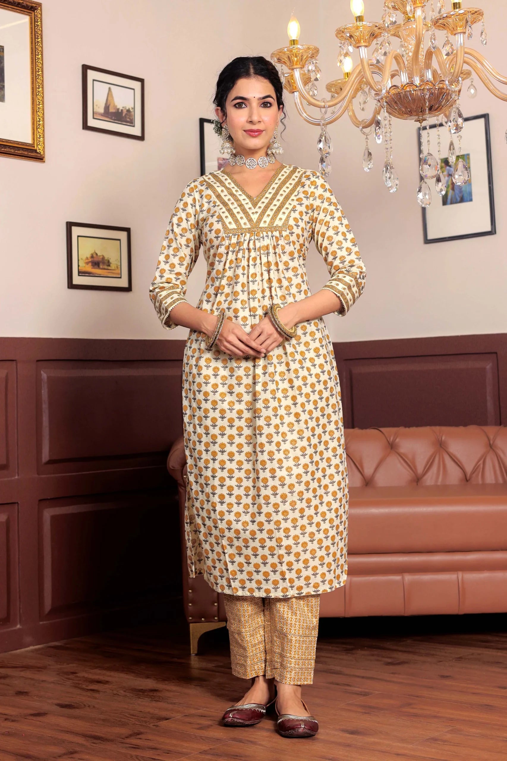 Mustard Printed cotton kurta highlighted with gotta lace with trouser