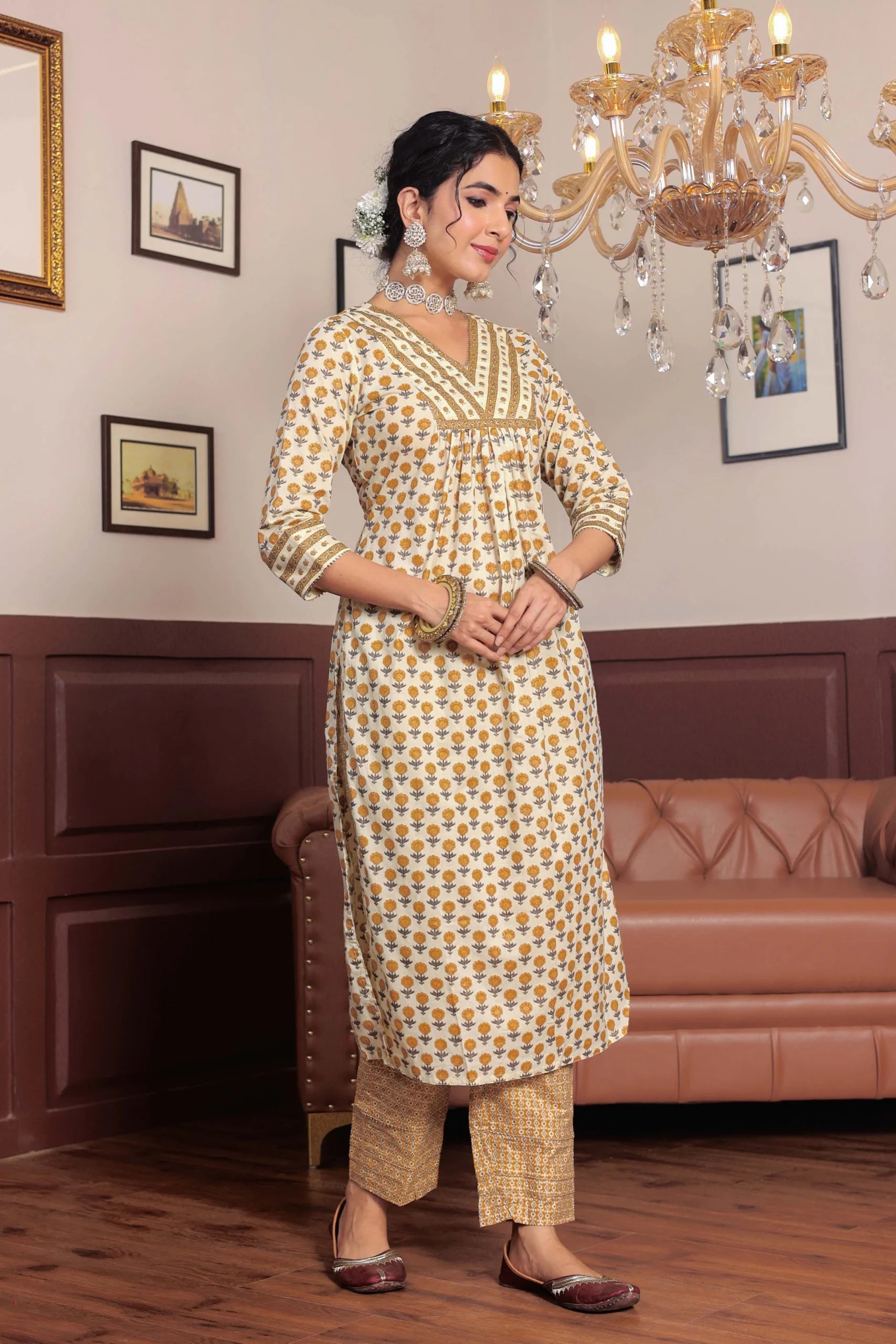 Mustard Printed cotton kurta highlighted with gotta lace with trouser